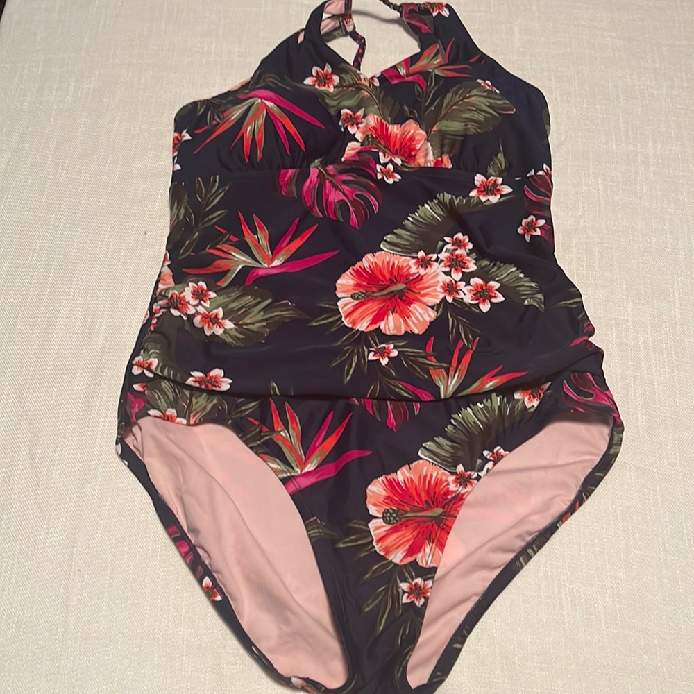 NEW. One piece size XL